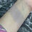 Thumbnail: Wrist with three different makeup shades, subtle shimmer, skin tone swatches.