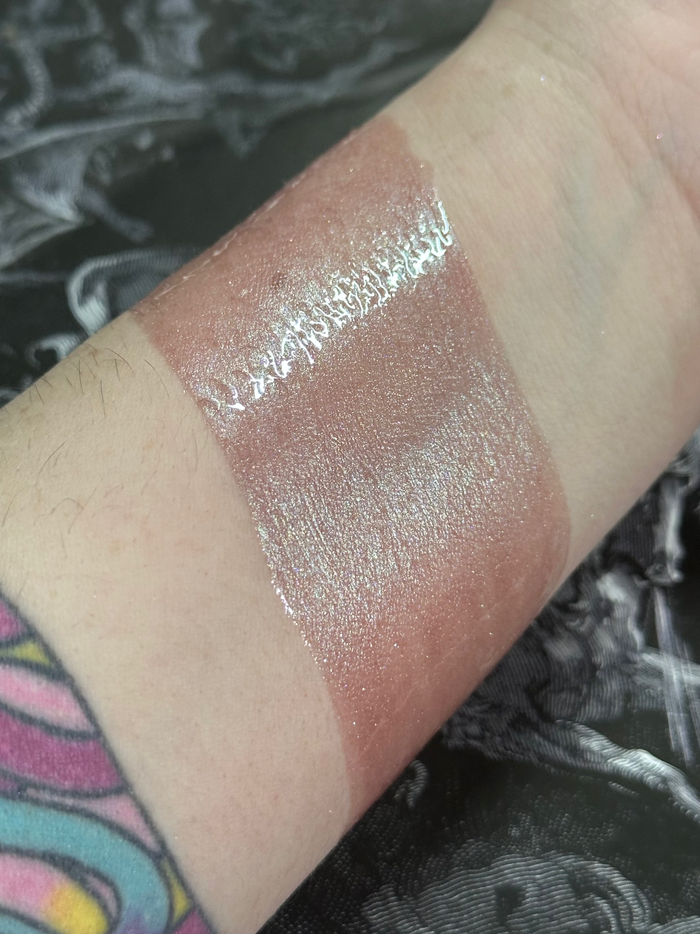 Swatches of Pallid Cream, Green Tea Extract & Copper Gluconate Moisturizer on a wrist