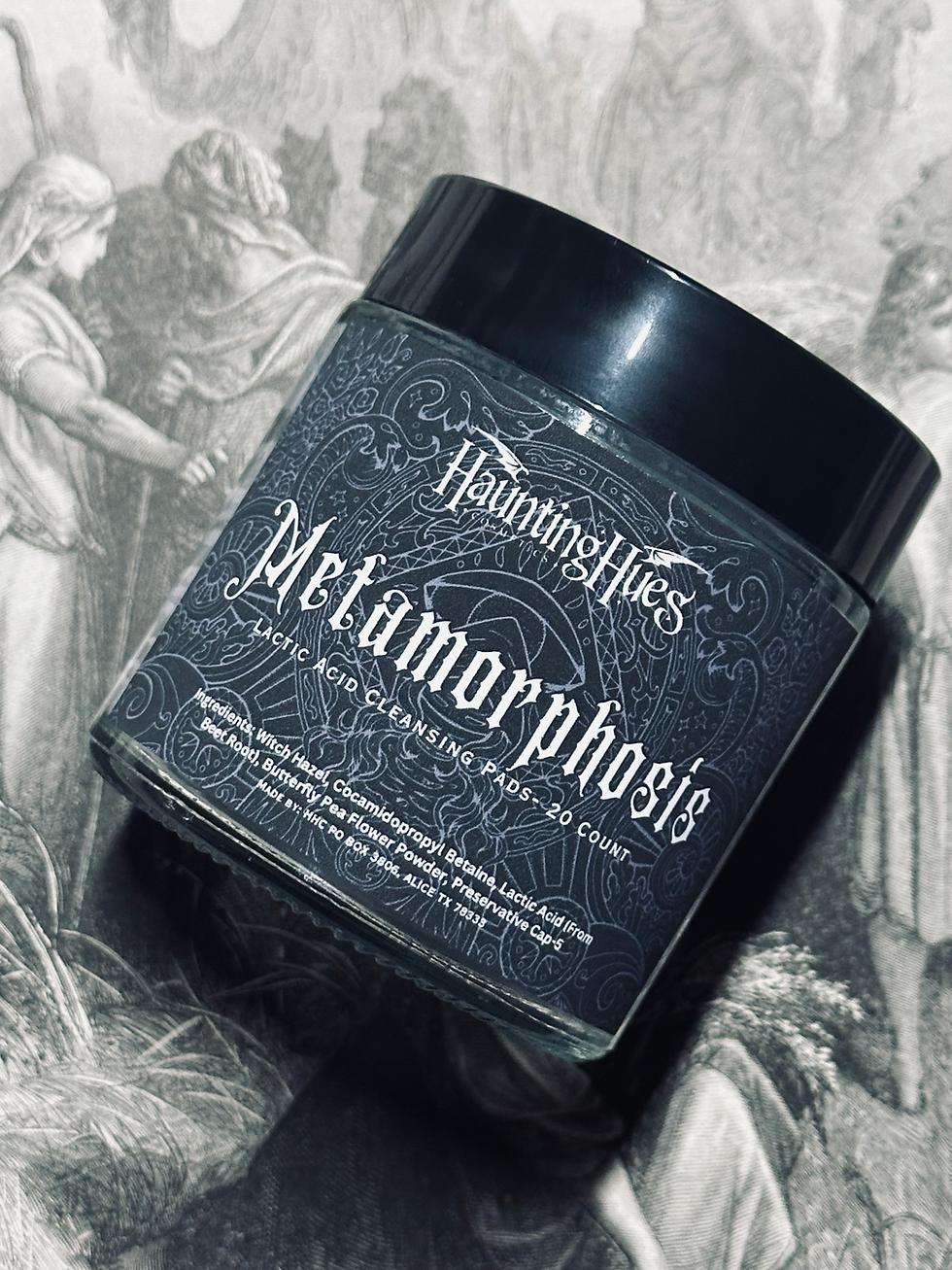 Haunting Hues Metamorphosis jar. Devilish Whispers - Green Shimmer Tone Velvet Creams. Dark background, product shot.