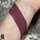 Thumbnail: Dust to Dust lipstick swatch on a wrist, Gaunt - Casket Contour Powder - Rice Powder included