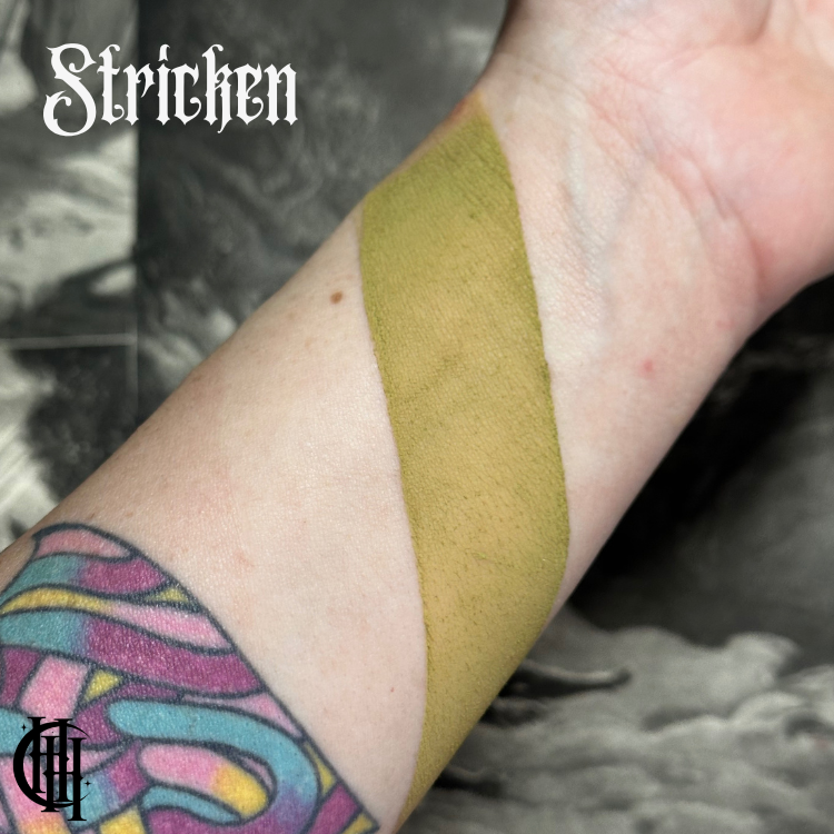 Arm with Strichen swatch. Morgue - Casket Contour Powder - Rice Powder applied on wrist.