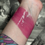 Thumbnail: Pink lipstick swatch on wrist Under the Moon - Gloomy Glow Highlighters - Vegan 