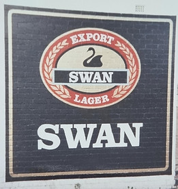 Beer sign hand painted on brick