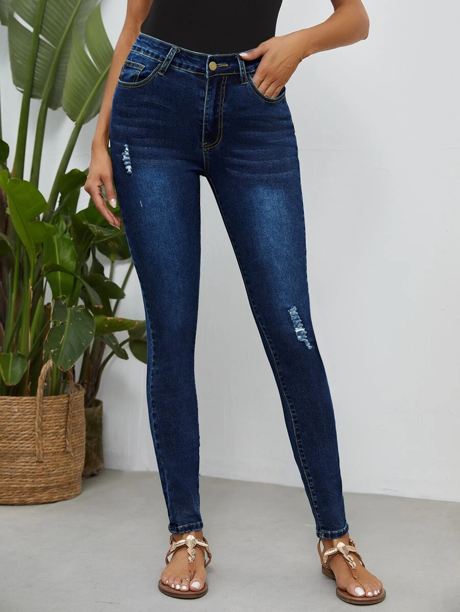 Jeans ajustados rotos de cintura alta