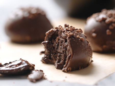 Area Woman Reaches For Chocolate First Thing in the Morning, Gobbles, “It’s All Downhill From Here."