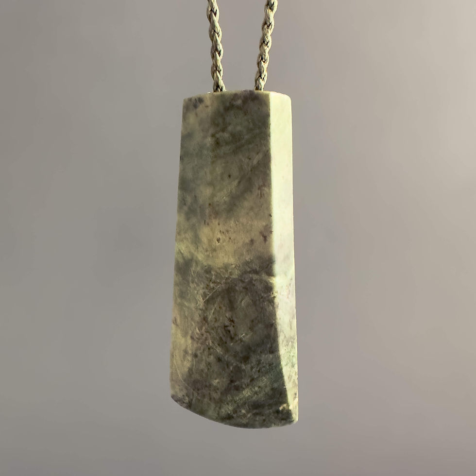 Front view of handcrafted Hei Toki / Chisel pendant from Aotearoa Stone Carving Studio