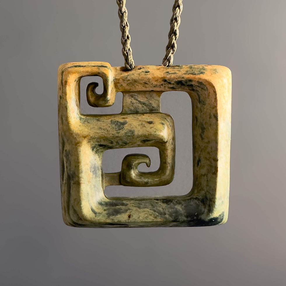 Front view of handcrafted Koru pendant from Aotearoa Stone Carving Studio