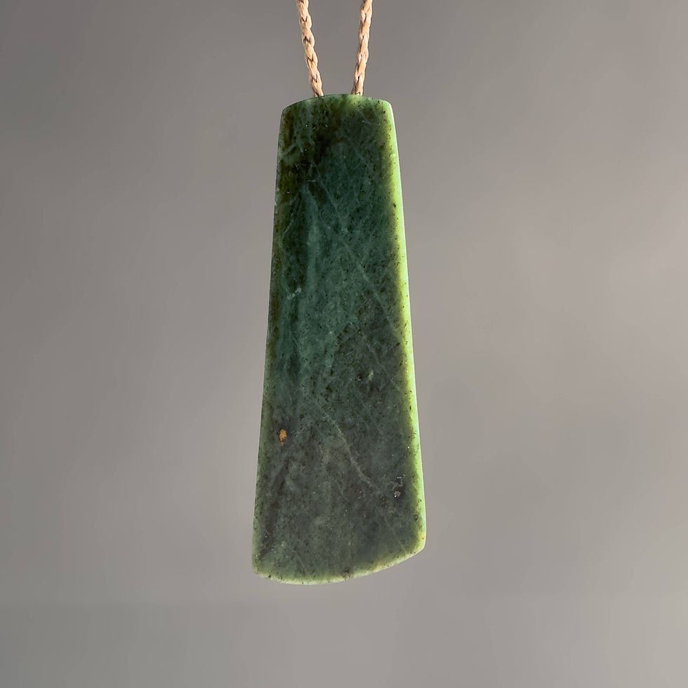 Rear view of handcrafted Hei Toki / Chisel pendant from Aotearoa Stone Carving Studio
