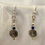 Thumbnail: These handmade gemstone earrings include a small faceted blue Lapis & round silver plated Sun Charm.