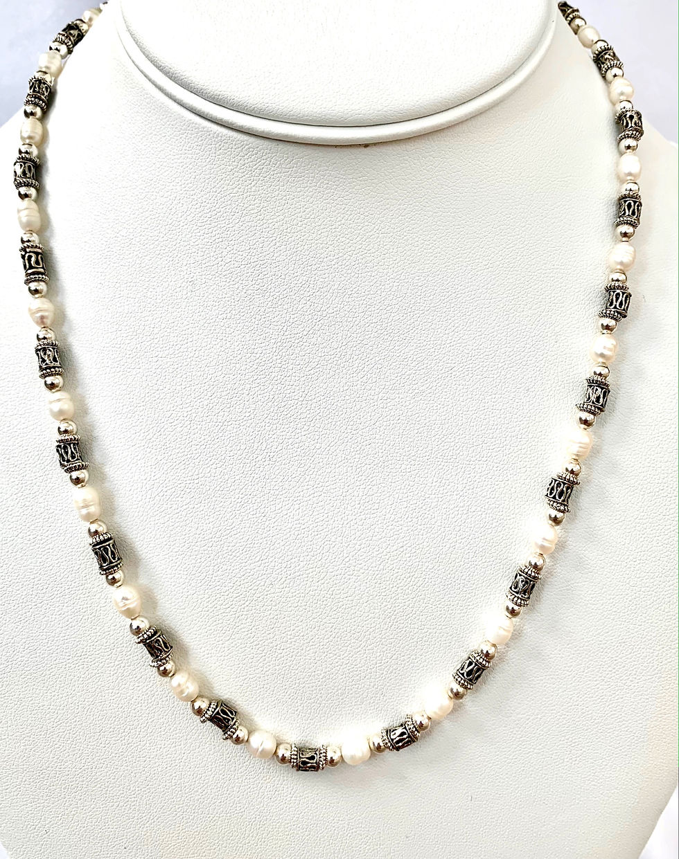 Thumbnail: This handmade gemstone necklace includes Freshwater Pearl and decorative silver plated beads.