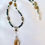 Thumbnail: This handmade gemstone necklace includes Rutilated Quartz, Nephrite Jade & Grey Moonstone & silver plated beads.