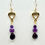 Thumbnail: These handmade gemstone earrings include Amethyst briolettes & Lepidolite beads dangling from a gold heart charm.