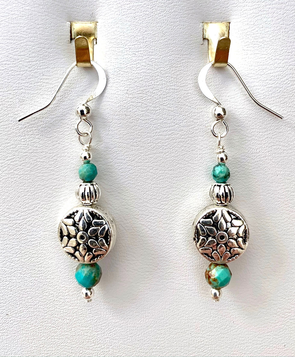 Thumbnail: These handmade gemstone earrings include African Turquoise & decorative silver plated circular beads.