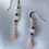 Thumbnail: These handmade gemstone earrings include a dangle of Rose Quartz, Moonstone & Rubellite Tourmaline on a silver plated chain.