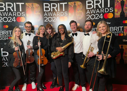 RAYE's band BRIT Awards 2024