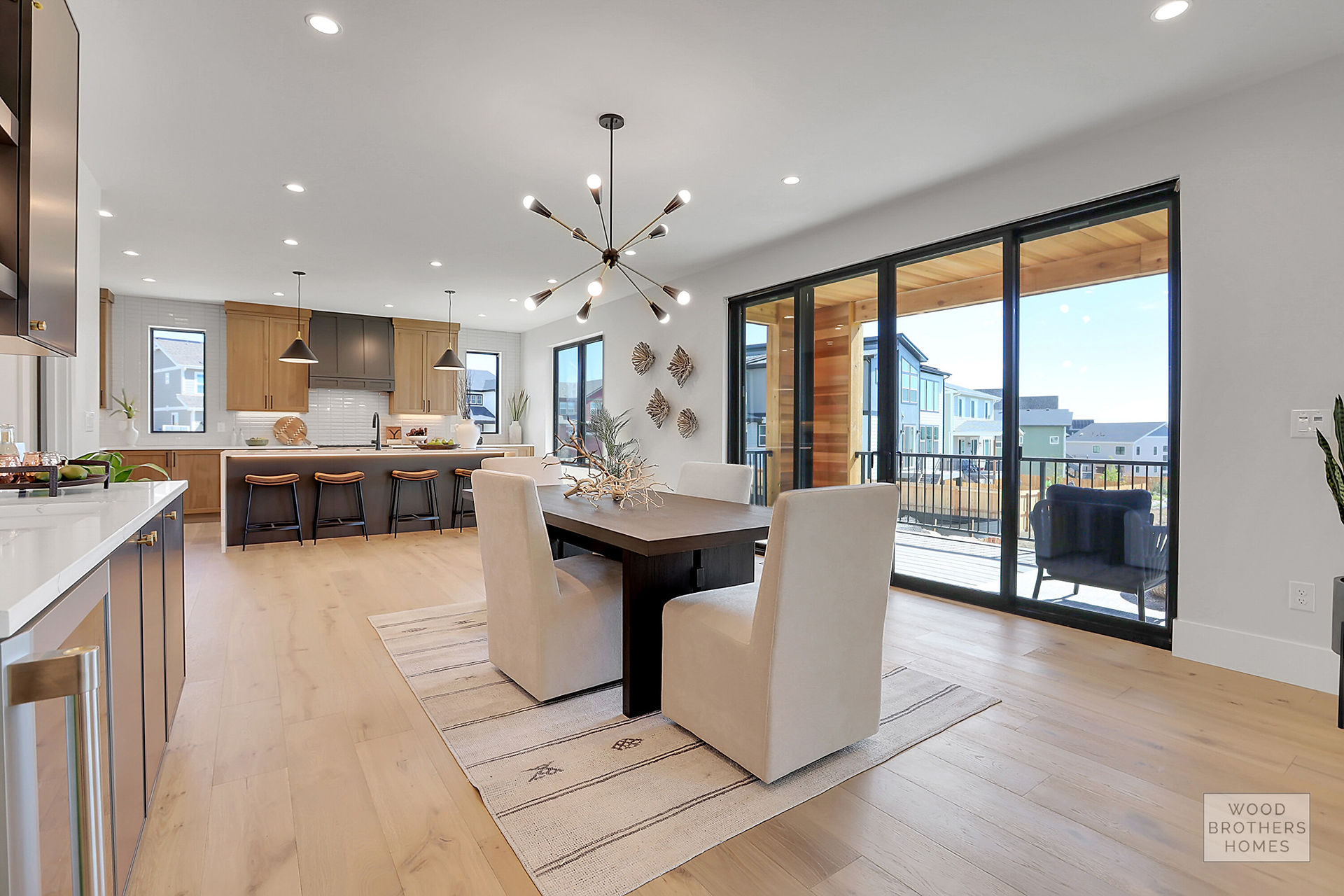 view of modern dining room and kitchen