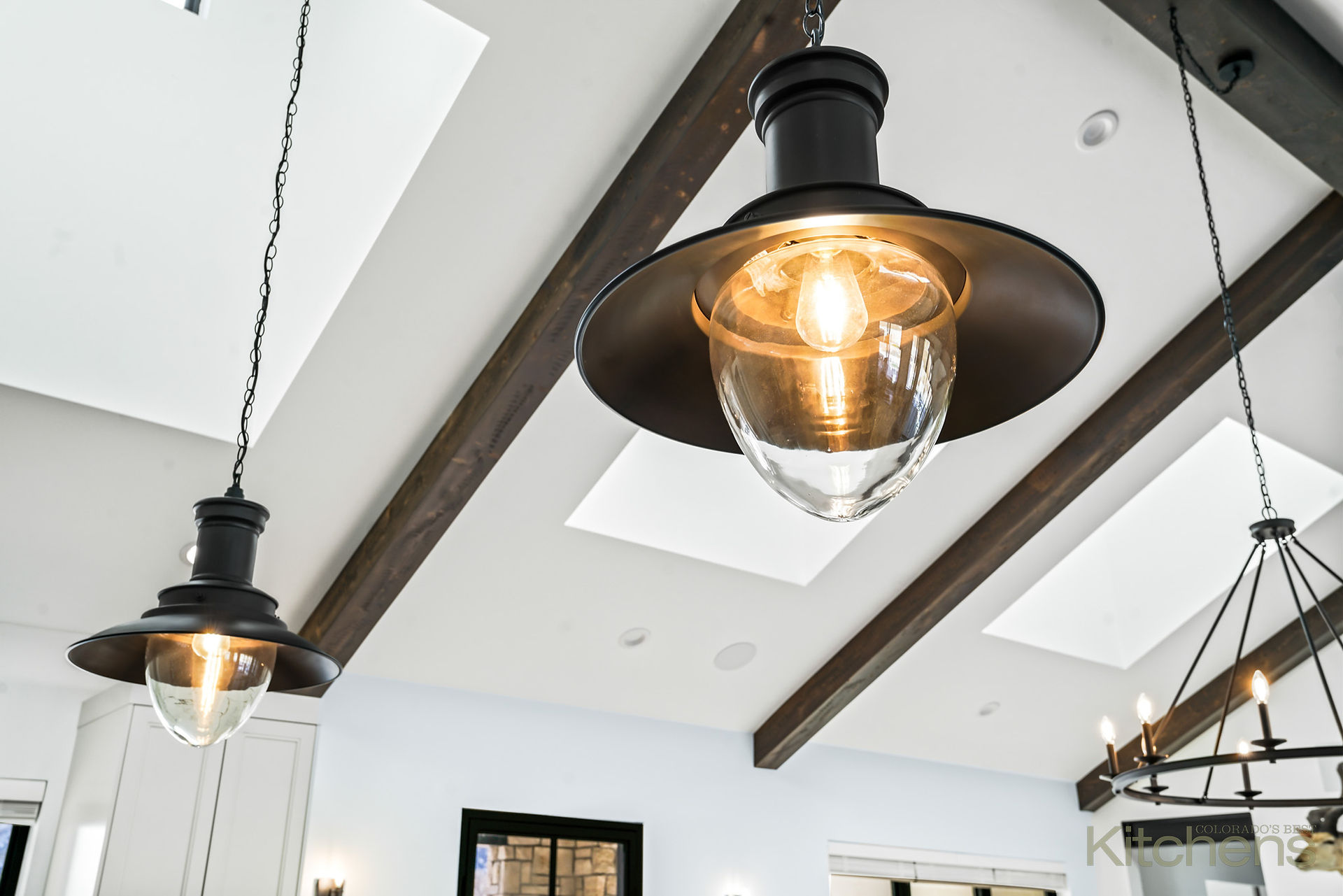 White luxury kitchen with a modern farmhouse vibe, SKS appliances, Parade of Homes featured. 