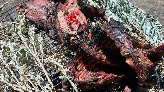 Full wallaby cooked over fire