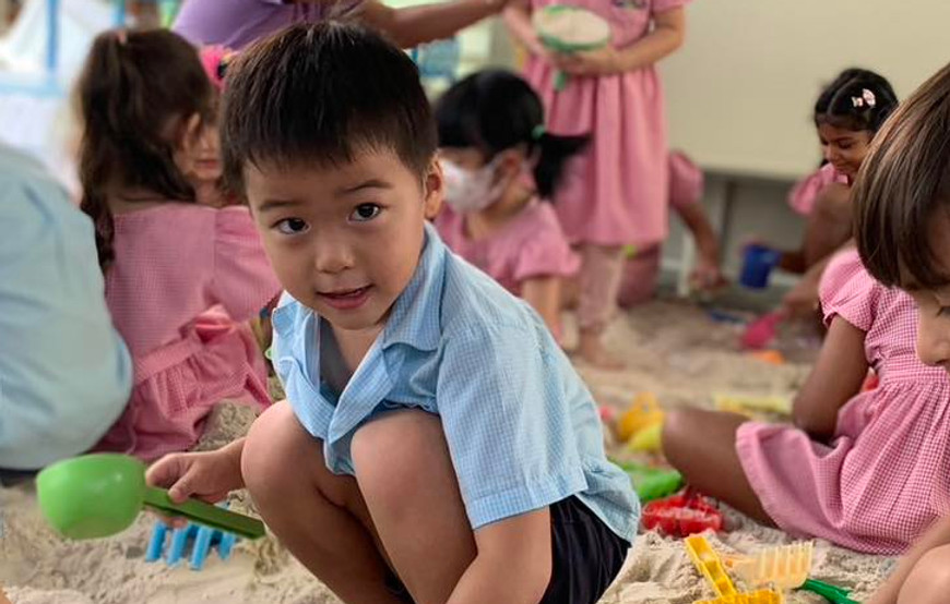 StoryTime kids playing in the sand