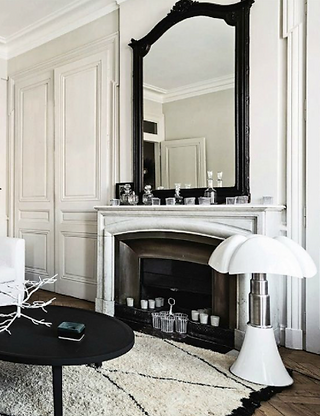 Large fireplace in newly renovated sitting room