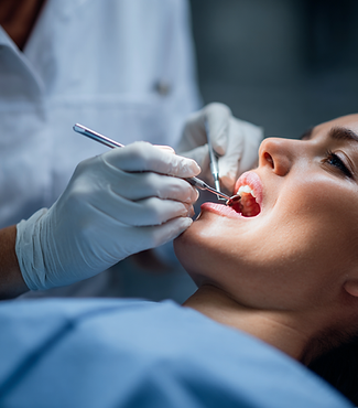 dentist performing dental procedure