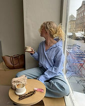 Luxury Fashion Influencer In Coffee Shop