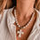 Miniatura: Collar cruz blanca 