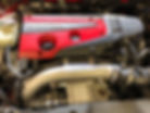 Honda engine bay prepared for mobile ECU remapping.