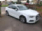 White Audi parked on a driveway for mobile ECU remapping.