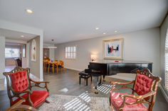Living area with piano flows seamlessly into formal dining room at 967 Erica Drive in Sunnyvale’s Ponderosa neighborhood