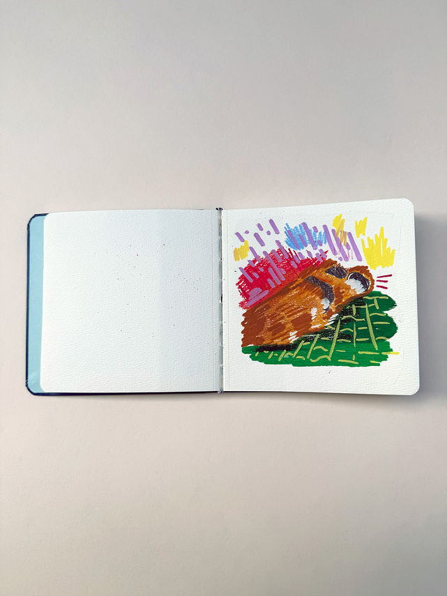 A small painting of a dogs paws 