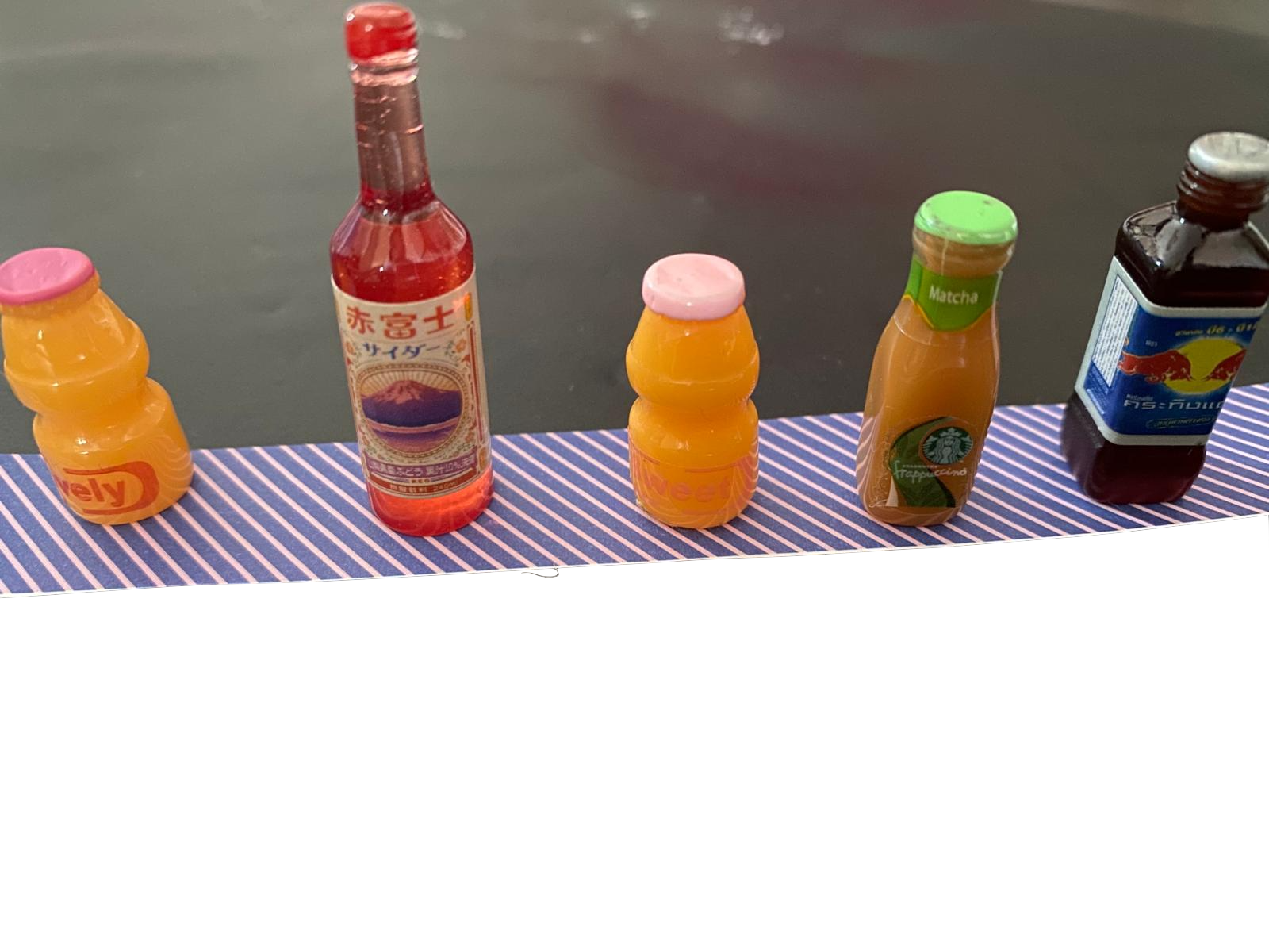 A SET OF 5 MINIATURE BOTTLES