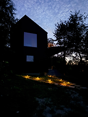 Enache's 217 Private Design Cabin in the evening