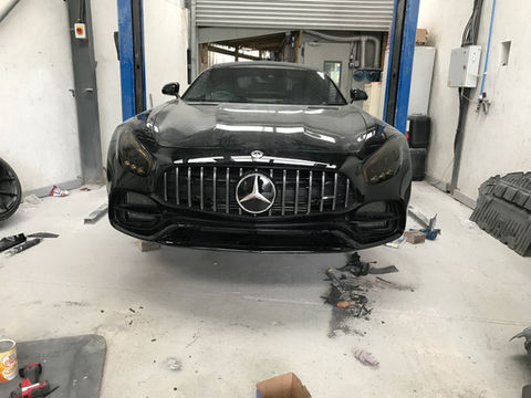 Black Mercedes-Benz GT undergoing repair at Ka Body Repairs
