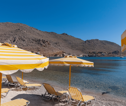 yellow and white striped umbrellas