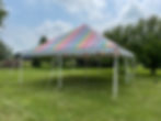 A 20'x20' rainbow canvas pole tent. Photo by Herriott's Rentals. 
