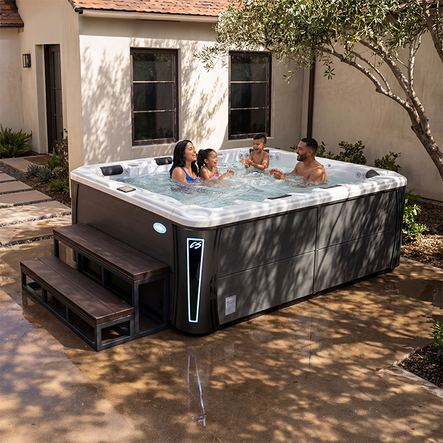 happy family in cal spas hot tub