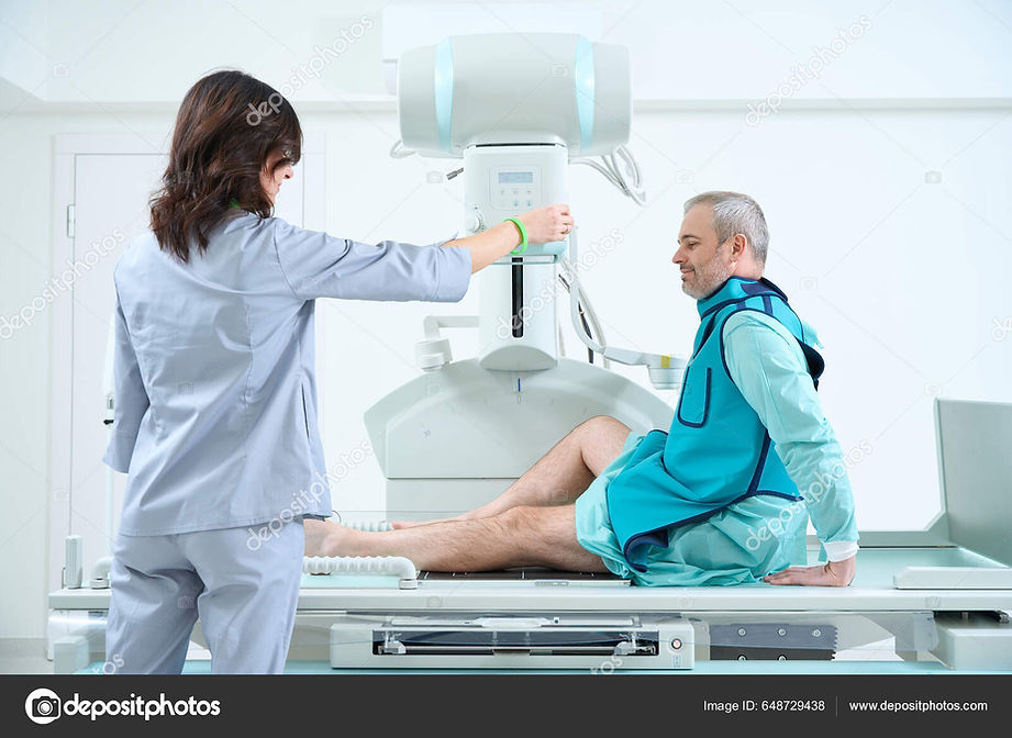 depositphotos_648729438-stock-photo-female-doctor-preparing-ray-equipment.jpeg
