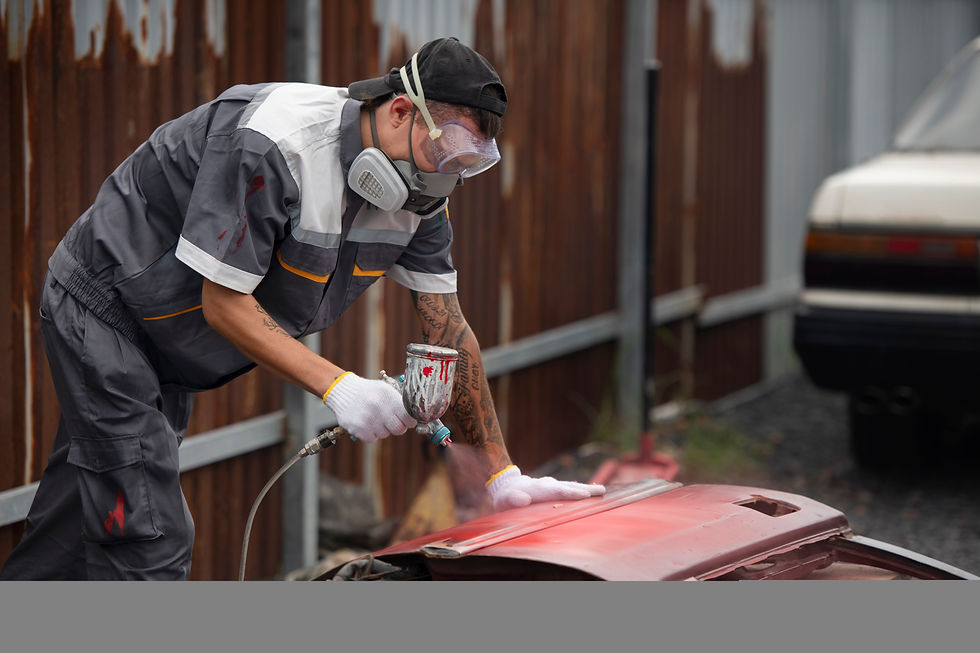 man-painting-car-door-side-view.jpg