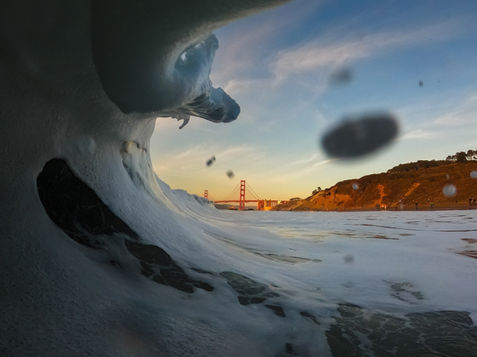 I believe fall is the most beautiful time in San Francisco – especially at golden hour. And the Pacific swell machine turns on this tie of year, which was the case this day, with beautiful skies and bigger waves slamming The Bakery. I love the variance of light throughout this image, from the dark colors inside the wave to the brightness of the bridge and the shiny light reflecting on the underside of the foamy lip of the wave.