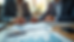 Eye-level view of a financial advisor reviewing documents with a client