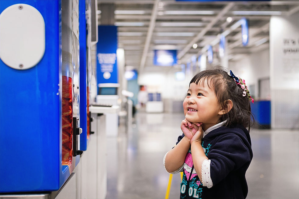 Smiling Girl at Vending Machine_edited.jpg