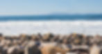 Background image of rocky beach.