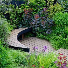 Petersham London garden design - curvaceous contemporary garden with bespoke curved benches -CITYSCAPERS