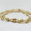 Miniaturbild: Armband Beige und goldfarbene Swarovskiperlen
