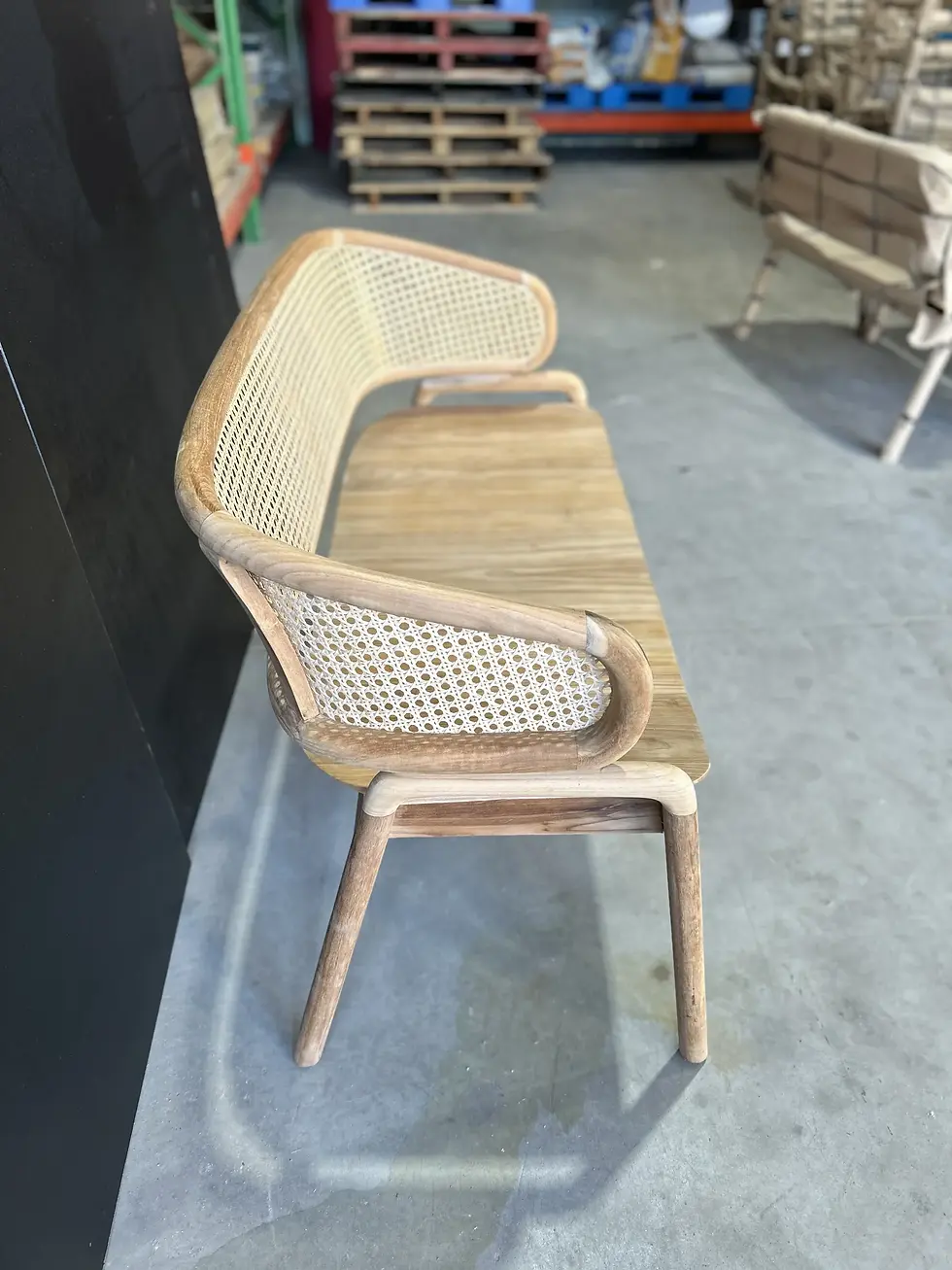 Thumbnail: Teak Rattan Bench Seat: handcrafted with a soft curved back and rattan detailing