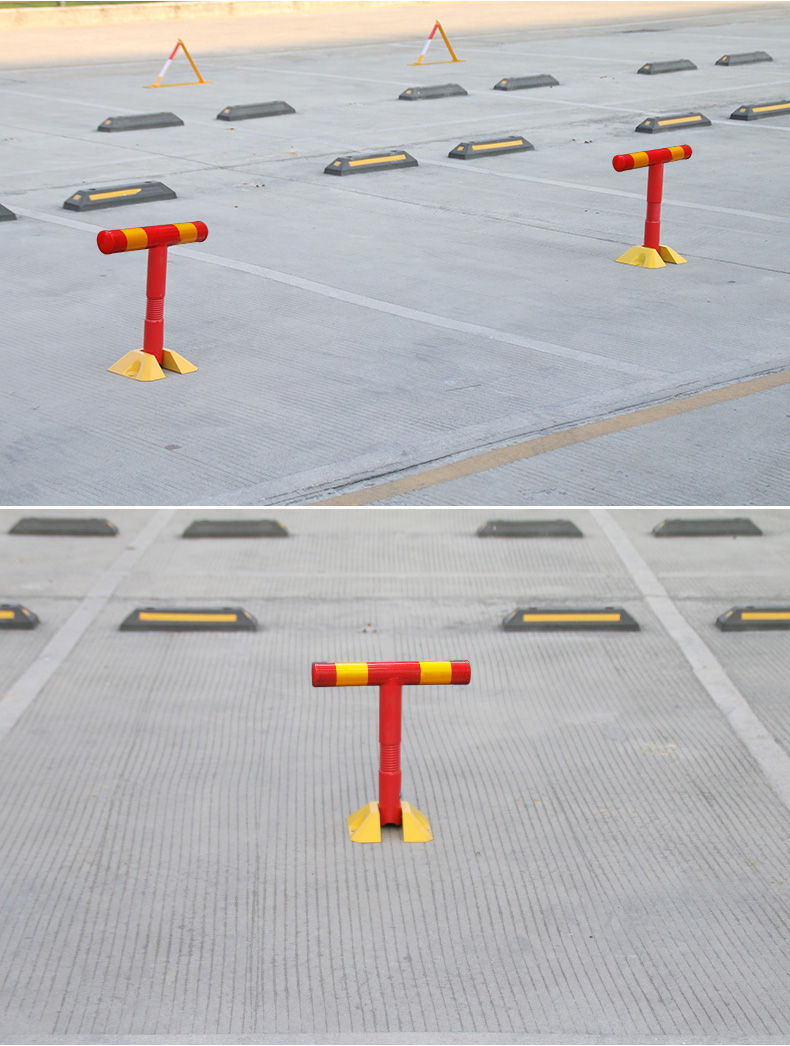 שומר חניה מכני בצבעי אדום וצהוב מותקן בצורה נכונה במרכז החניה, מדגיש את חשיבות המיקום לבטיחות ויעילות.