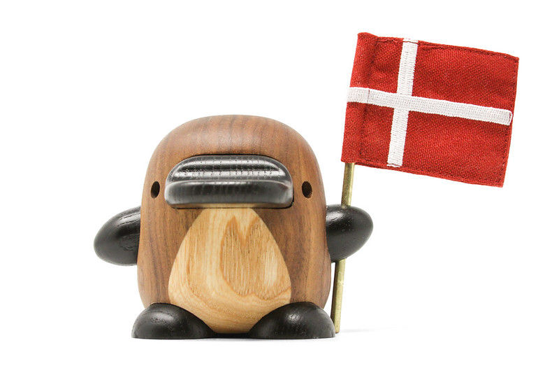 fablewood platypus holding a danish flag