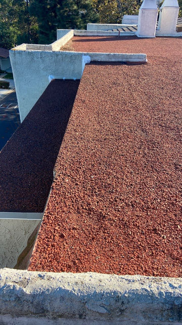roof repair company that fixes flat roofs like torch down