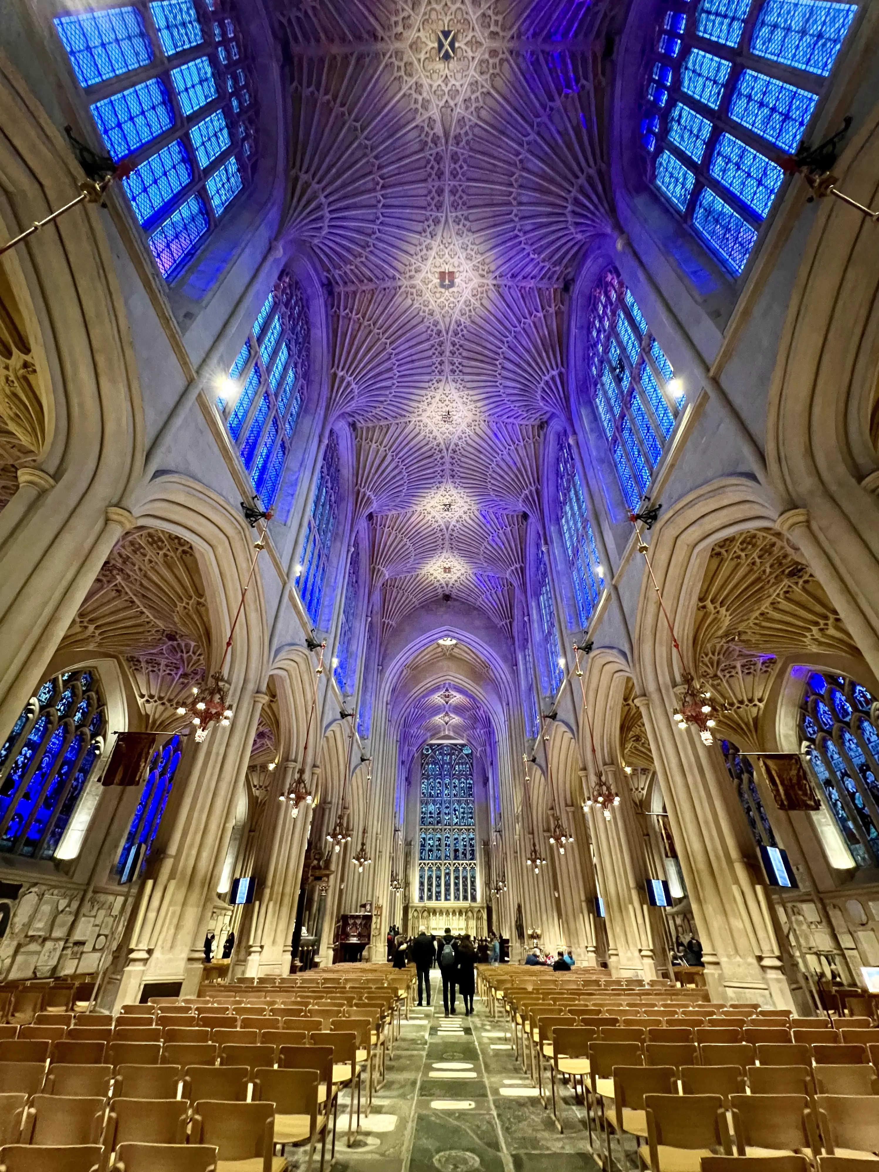 The Bath Abbey cathedral in Bath England with its soaring fan vaulting ceiling dating from the 1500s and stain glass windows ©AOnozWright